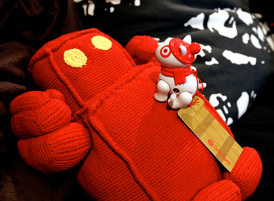 red robot plush ravaged by target gift card puppy